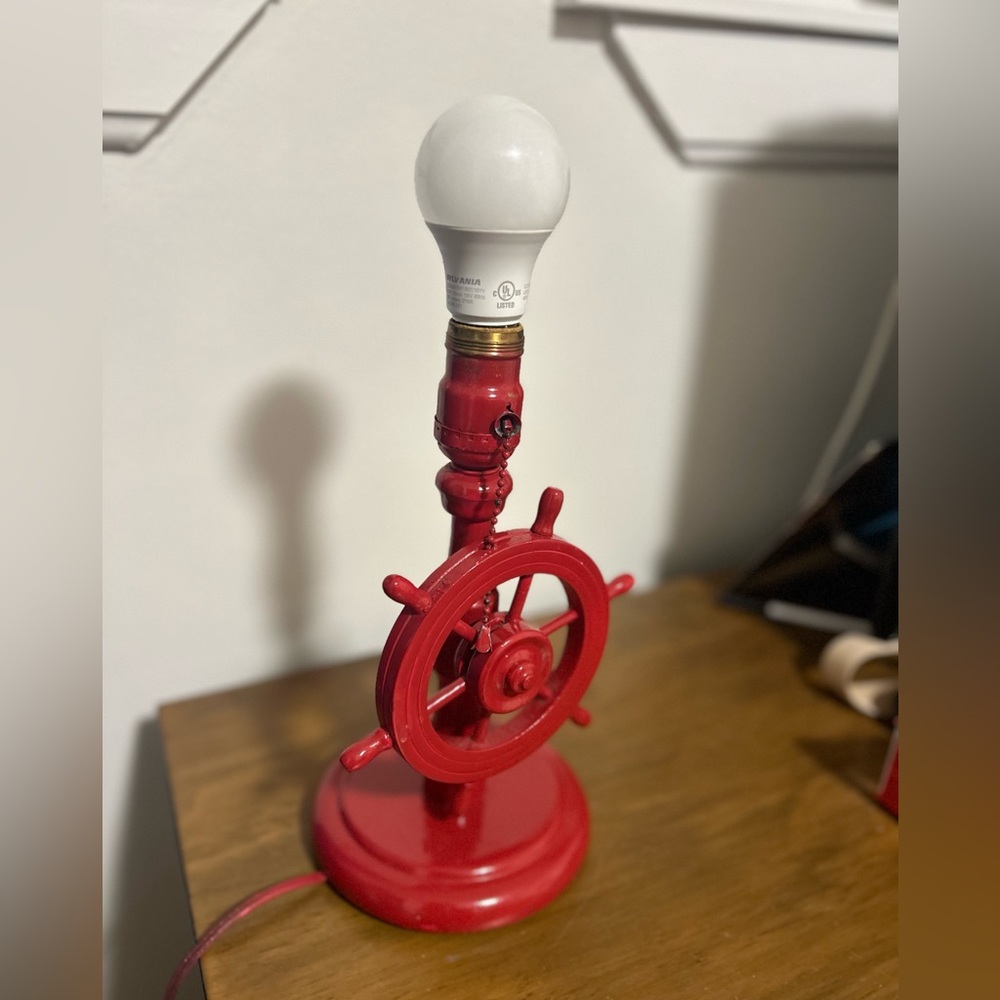 Cute red lamp with vintage boat helm switch